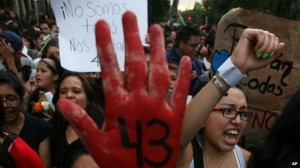 Protestors in Mexico demand answers from the government about the disappearance of 43 normalista students in Iguala, Guerrero. Photo: Associated Press.