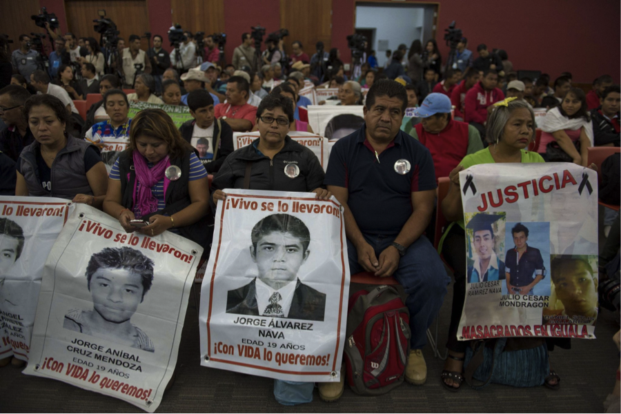 Family members and friends of missing Ayotzinapa students wait for an international panel of experts to presents its findings. Source: New York Times