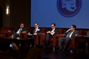 Anti-corruption panel moderated by Alejandro Rios Rippa. Panelists include Peter Ainsworth, Dr. Marco Antonio Fernández, and Benjamin Hill