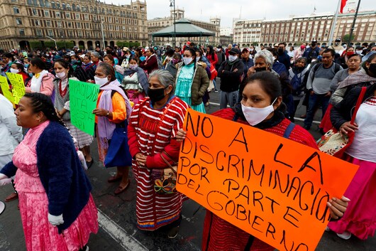 Indigenous artisan women protesting outside of the National Palace in Mexico City on May 11, 2020 to demand financial support during the COVID-19 pandemic. Photo: The Washington Post.